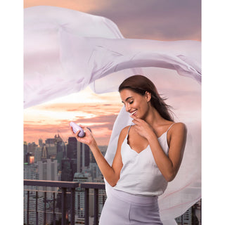 Womanizer Liberty Pulsator, vibrator in Lila, Anwendung