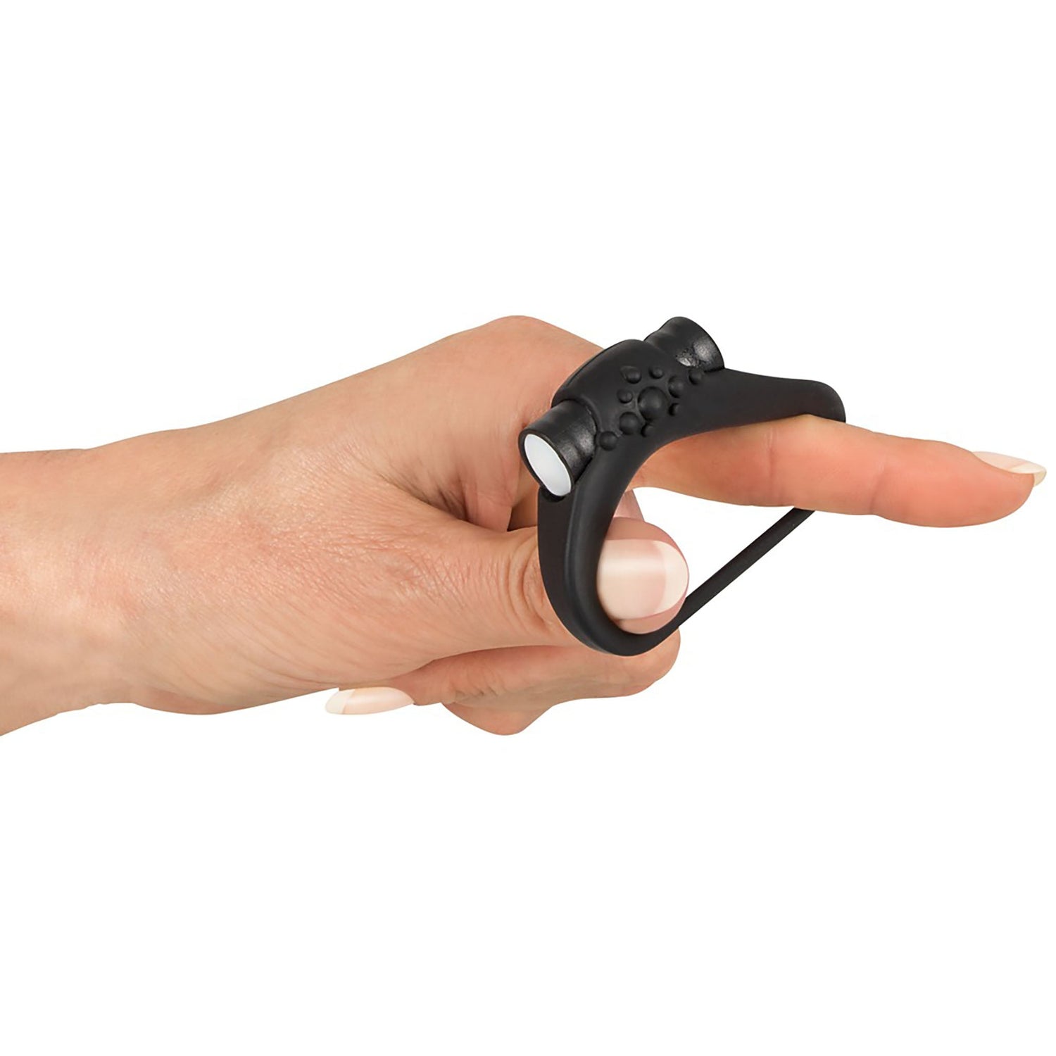 Vibrierender Penisring in schwarz auf einer Hand