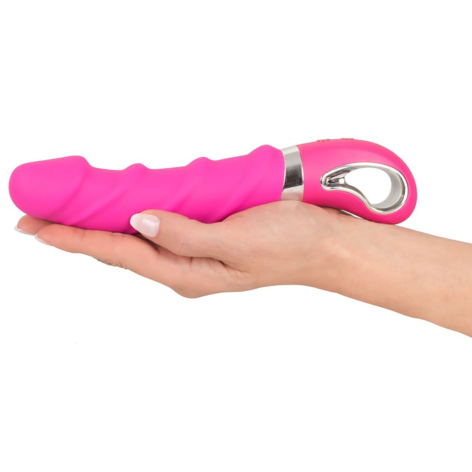 Wärmender Soft Vibrator in Pink in einer Hand gehalten